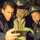 Wellington Paranormal's two cop characters pose for a selfie with an alien in the comedy series' second episode.